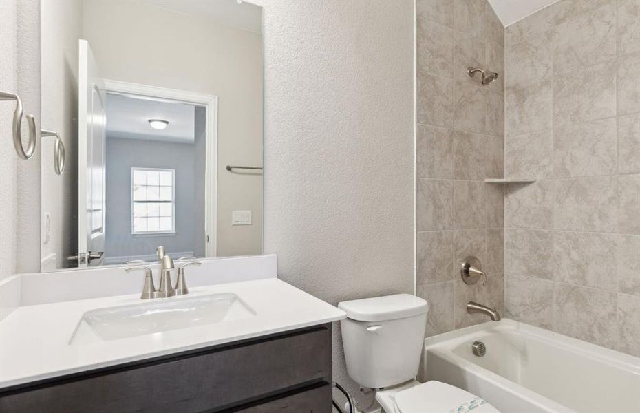 Spacious secondary bathroom *real home pictured