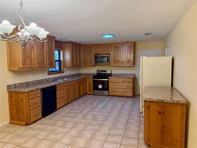 Furnished interior view inside a new home in , Whitney (Image 4).
