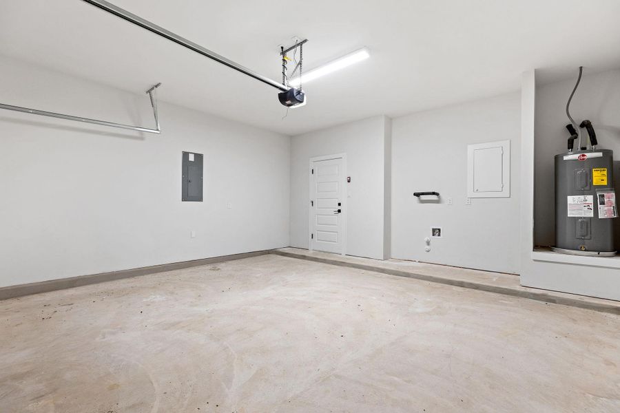 A spacious and pristine garage, ready for vehicles and extra storage. A spacious and pristine garage, ready for vehicles and extra storage.
