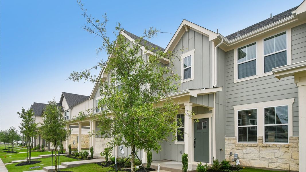 Front exterior of a new home in Avery Centre, Round Rock, TX, highlighting curb appeal (Image 2). Front exterior of a new home in Avery Centre, Round Rock, TX, highlighting curb appeal (Image 2).