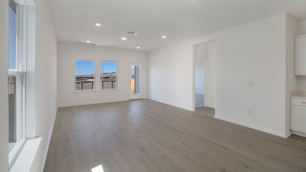 Representative unfurnished interior of a home built from the Hanna by D.R. Horton in Caldwell Crossing, Iowa Colony (Image 8). Representative unfurnished interior of a home built from the Hanna by D.R. Horton in Caldwell Crossing, Iowa Colony (Image 8).