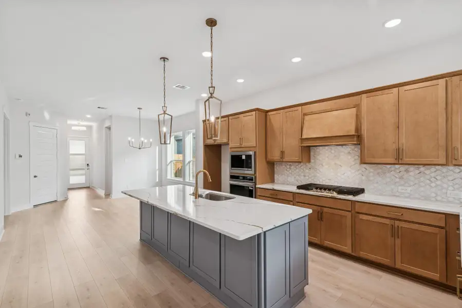 Furnished interior view inside a new home in The Highlands 40', Porter (Image 4). Furnished interior view inside a new home in The Highlands 40', Porter (Image 4).