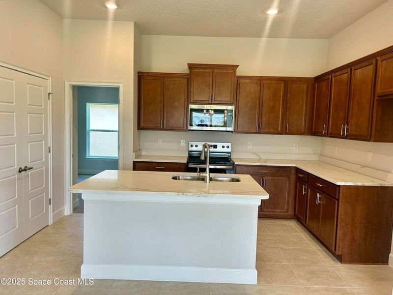 Furnished interior view inside a new home in St. John Preserve, Palm Bay (Image 4).