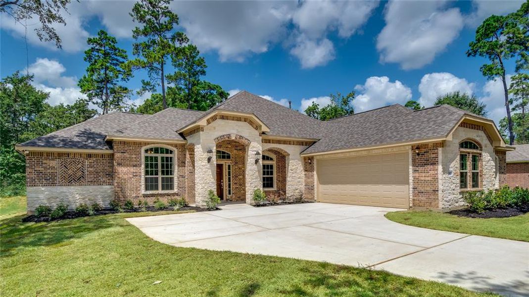 Home is under construction.  Photos are of a recently completed home by this builder.  New home will have similar finishes.