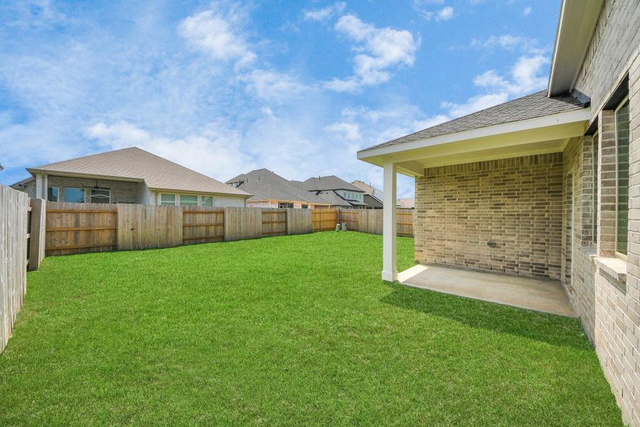 Exterior details and patio area of a home in 45' Traditional Homes at Elyson, Katy (Image 3).