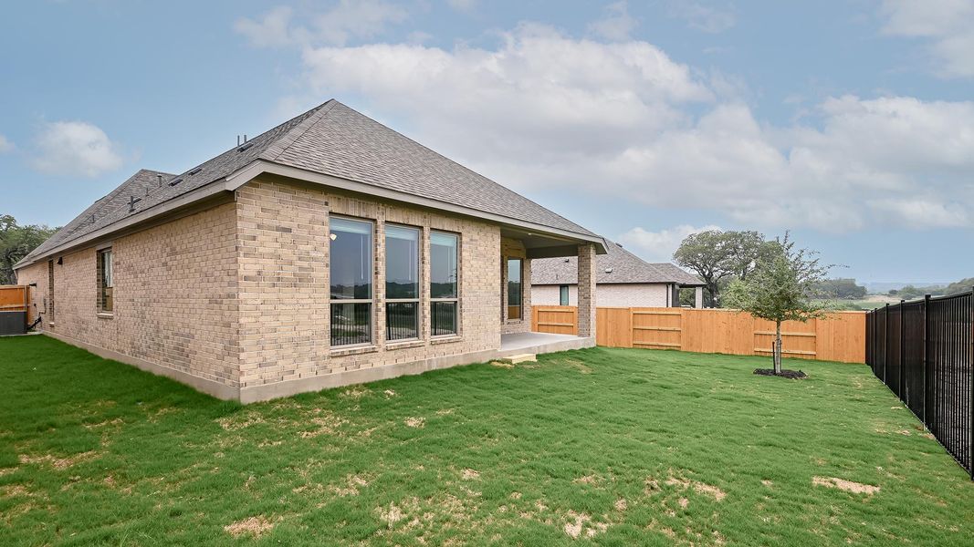 Exterior details and patio area of a home in 6 Creeks, Kyle (Image 4).
