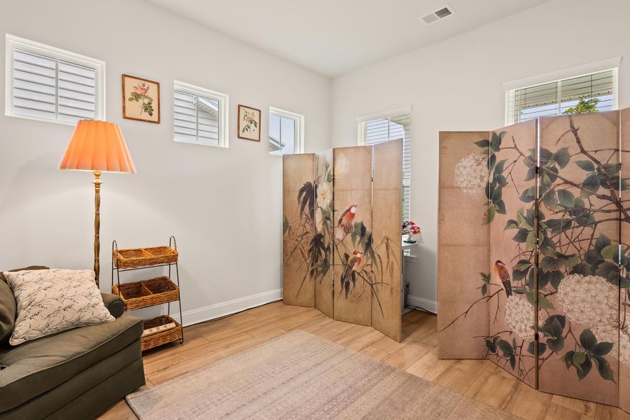 Furnished interior view inside a new home in Sweetgrass at Summers Corner, Summerville (Image 5).