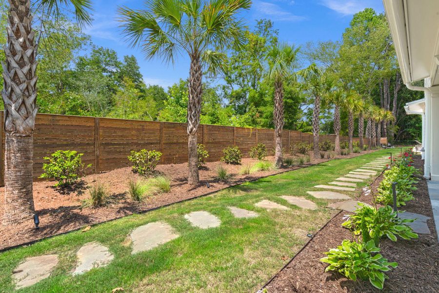 Exterior details and patio area of a home in , Johns Island (Image 43).
