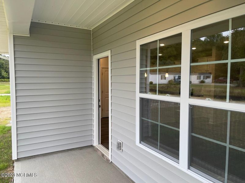Exterior details and patio area of a home in Summer Place, Grimesland (Image 3).