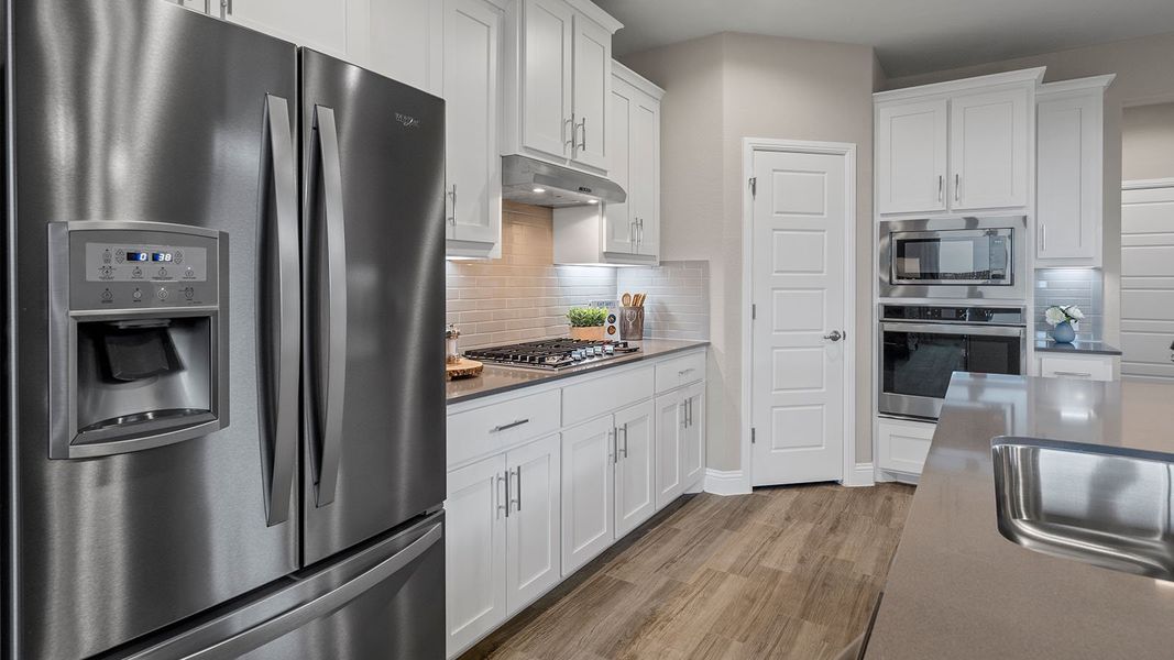 Representative furnished interior of a home built from the Wimberley by D.R. Horton in Lakeview Pointe, Grand Prairie (Image 13).