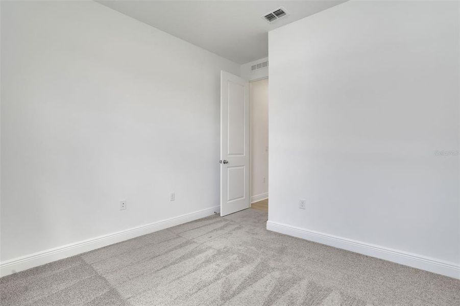 Spacious, unfurnished interior of a new home in Reserve at Hammock Oaks, Lady Lake (Image 29).