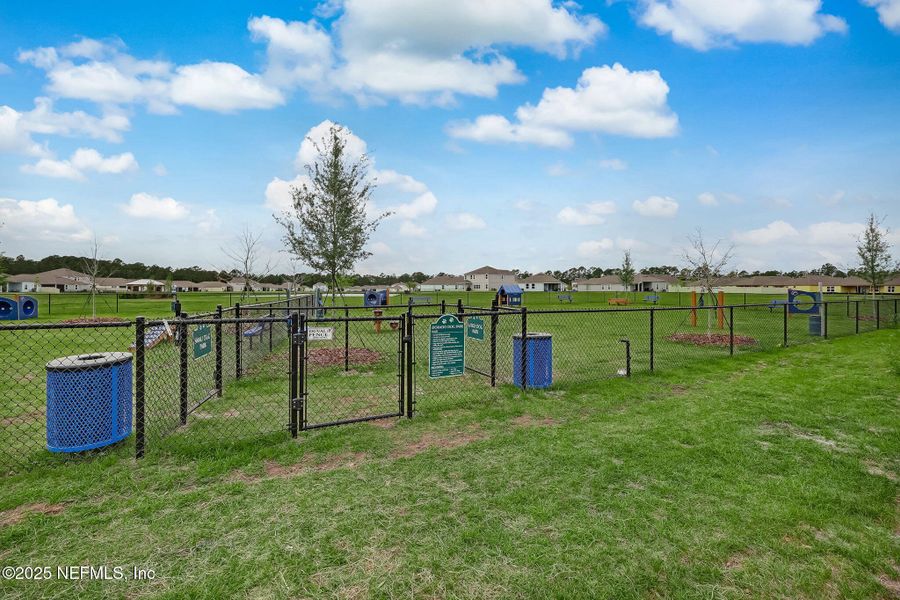 Front exterior of a new home in Dorado at Entrada, St. Augustine, FL, highlighting curb appeal (Image 21).