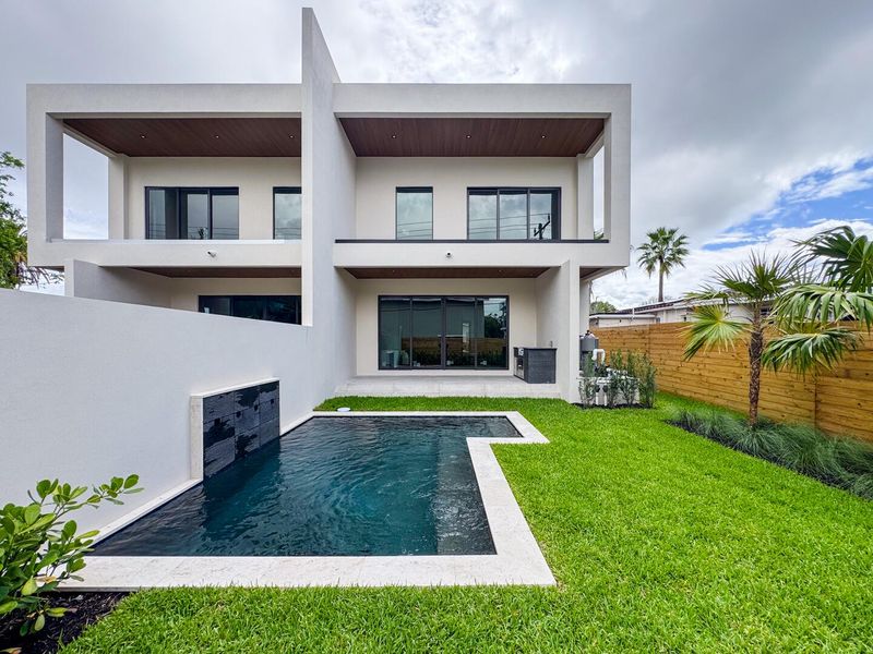 (as of April 8, 2026) west-facing backyard with privacy wall, 11x14 spa pool, and well landscaped