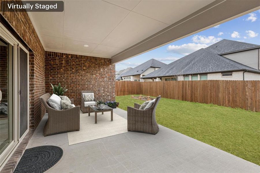 Exterior details and patio area of a home in Wolf Creek Farms - Signature Series, Melissa (Image 3).