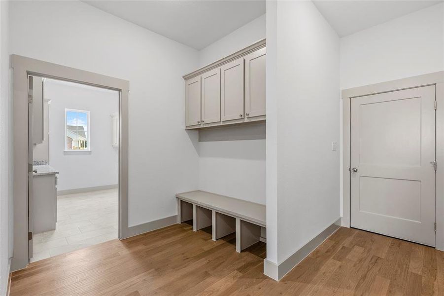 Custom cabinetry and tons of storage throughout the home