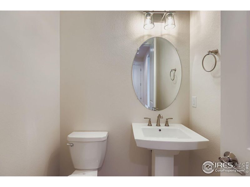 Furnished interior view inside a new home in RainDance National 60/70, Windsor (Image 9).