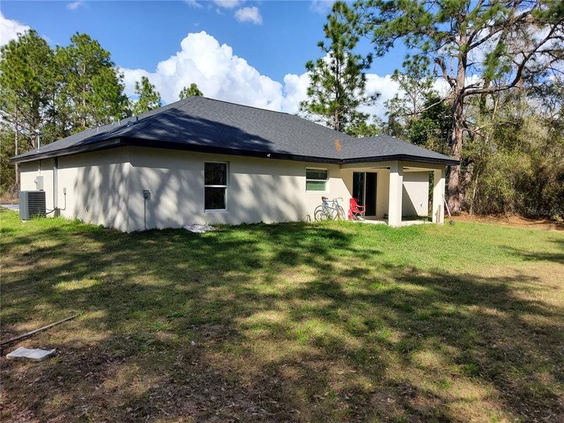 Exterior details and patio area of a home in , Ocklawaha (Image 4).