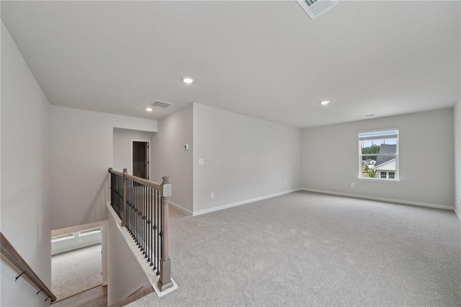 Spacious, unfurnished interior of a new home in Vines at Mill Creek - Estate Series, Braselton (Image 31).