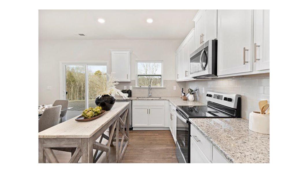 Representative furnished interior of a home built from the Taylor by D.R. Horton in Falls at Hickory, Hickory (Image 9).