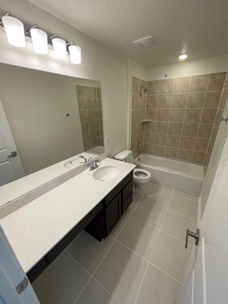 Furnished interior view inside a new home in Mustang Valley, Manor (Image 6). Furnished interior view inside a new home in Mustang Valley, Manor (Image 6).