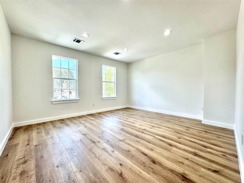 Primary bedroom with ensuite bathroom and walk-in closet. Primary bedroom with ensuite bathroom and walk-in closet.