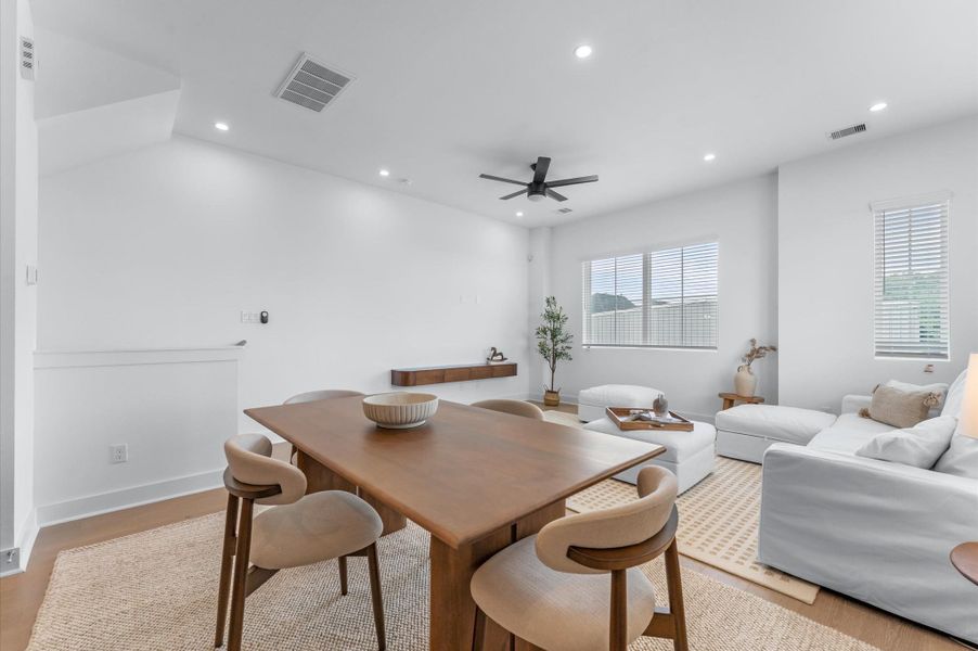 The dining area is seamlessly integrated into the open-concept kitchen, living, and dining space, offering plenty of room for a large dining table, perfect for hosting family gatherings, dinner parties, or everyday meals, while maintaining a bright, open, and inviting atmosphere.