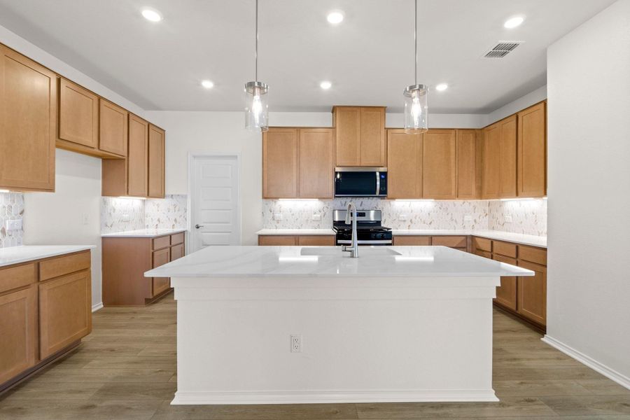 Furnished interior view inside a new home in Salerno - Classic Collection, Round Rock (Image 13). Furnished interior view inside a new home in Salerno - Classic Collection, Round Rock (Image 13).