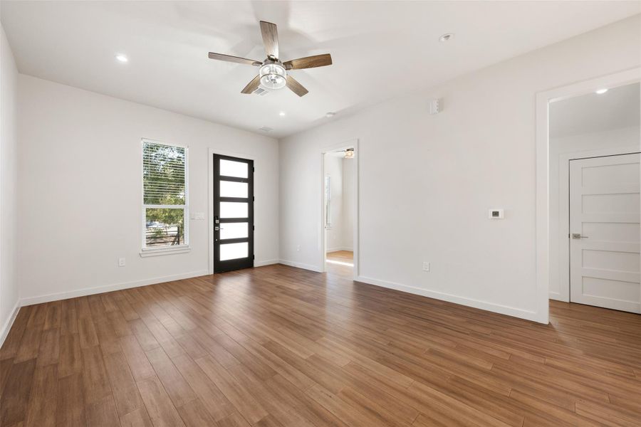 Empty room featuring recessed lighting, wood finished floors, and ceiling fan