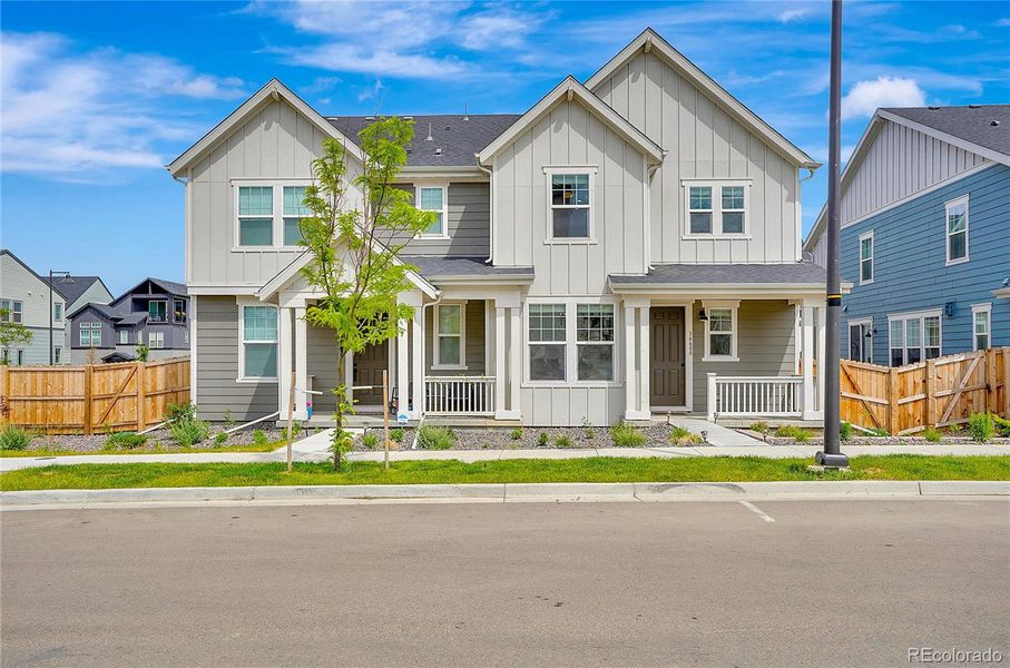 Front exterior of a new home in , Broomfield, CO, highlighting curb appeal (Image 27).