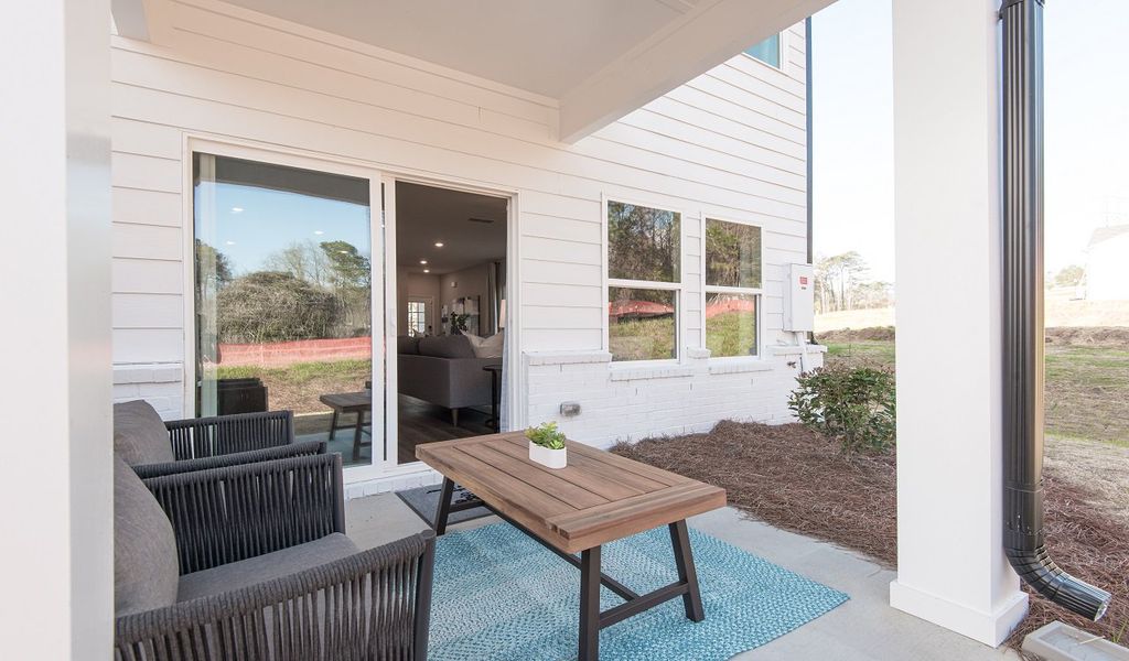 Sip your morning coffee on the covered back patio.