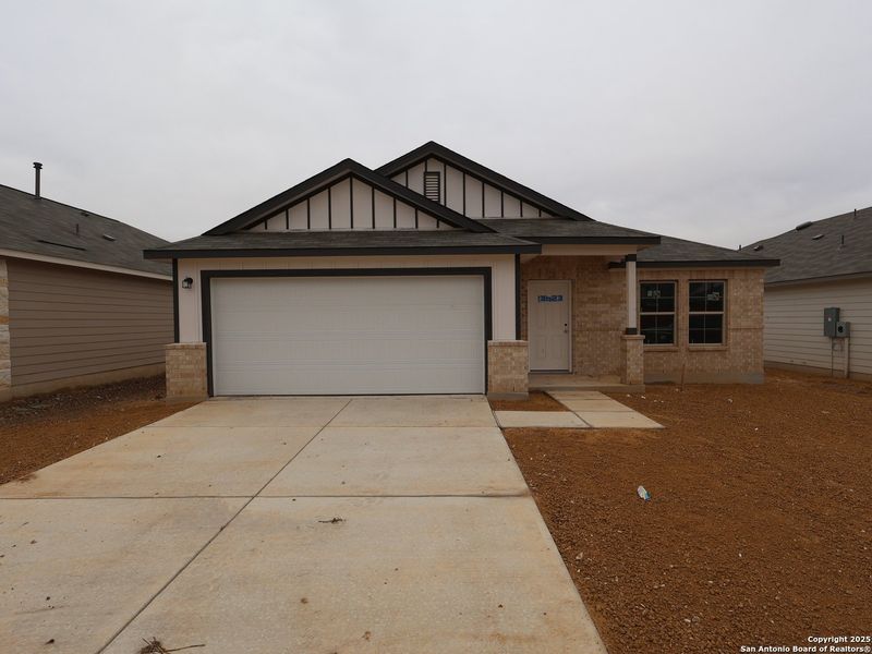 Front exterior of a new home in Winding Brook, San Antonio, TX, highlighting curb appeal (Image 1). Front exterior of a new home in Winding Brook, San Antonio, TX, highlighting curb appeal (Image 1).