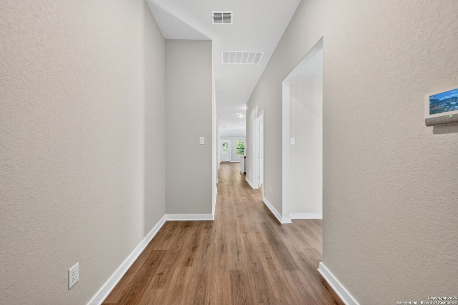 Spacious, unfurnished interior of a new home in Winding Brook, San Antonio (Image 29).