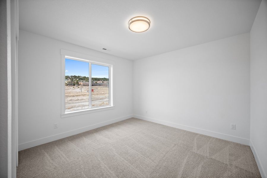 Spacious, unfurnished interior of a new home in Jackson Creek, Monument (Image 31).
