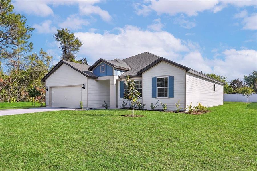 Front exterior of a new home in , Palm Coast, FL, highlighting curb appeal (Image 2).