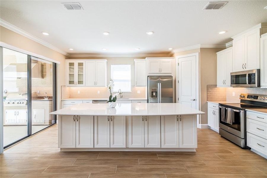 Furnished interior view inside a new home in Esplanade at Wiregrass Ranch, Wesley Chapel (Image 16).