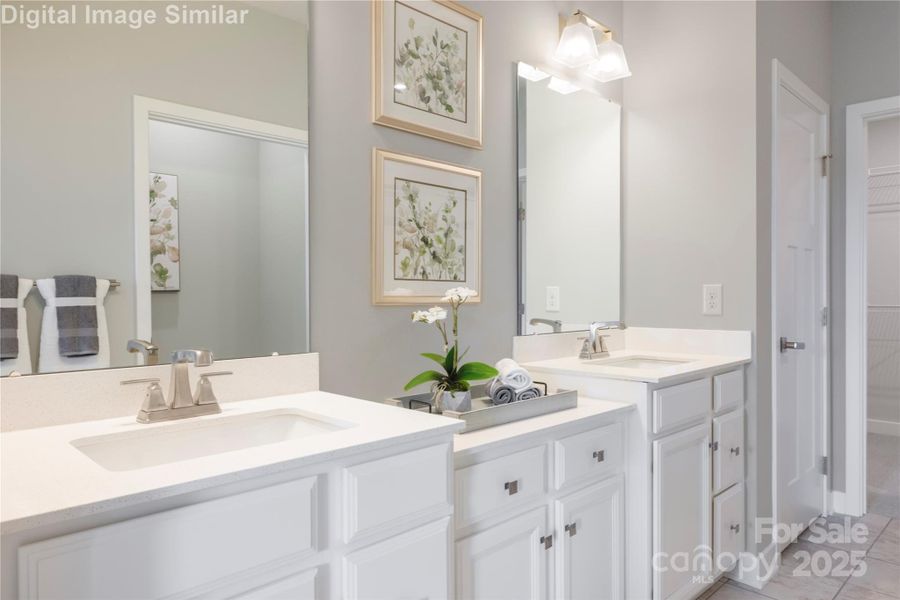 Wake up and step into luxury—your main-level primary bedroom offers direct access to a spa-inspired bath and the open-concept living space beyond. No stairs, no barriers—just seamless flow, effortless comfort, and everyday elegance. It’s the kind of layout that turns routines into rituals.