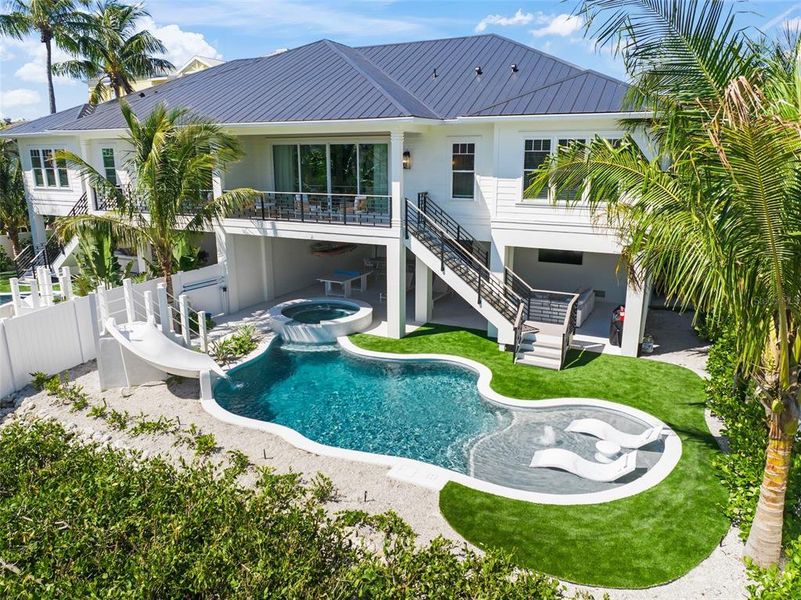 Front exterior of a new home in , Sarasota, FL, highlighting curb appeal (Image 1).