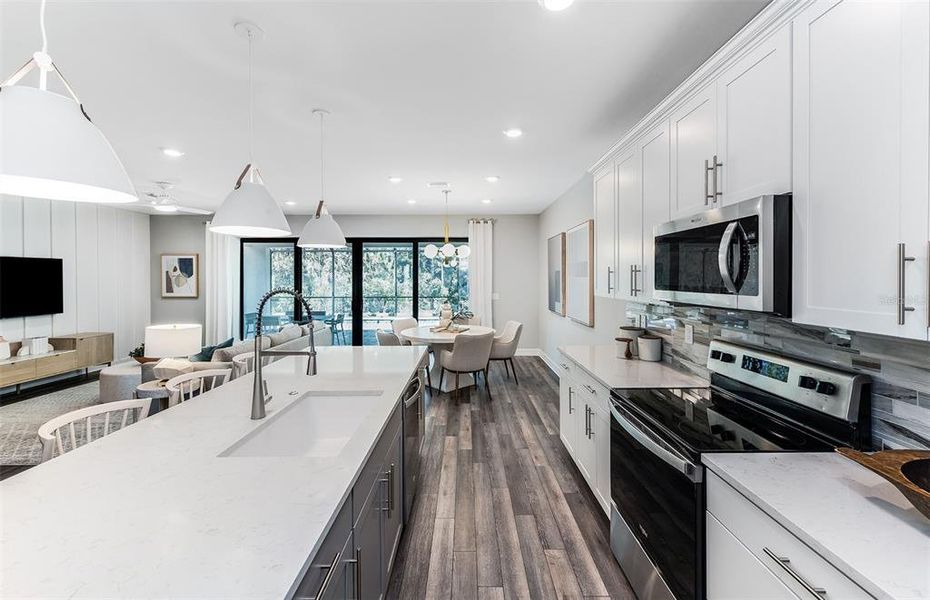 Furnished interior view inside a new home in The Strand at Cedar Grove, North Port (Image 7). Furnished interior view inside a new home in The Strand at Cedar Grove, North Port (Image 7).