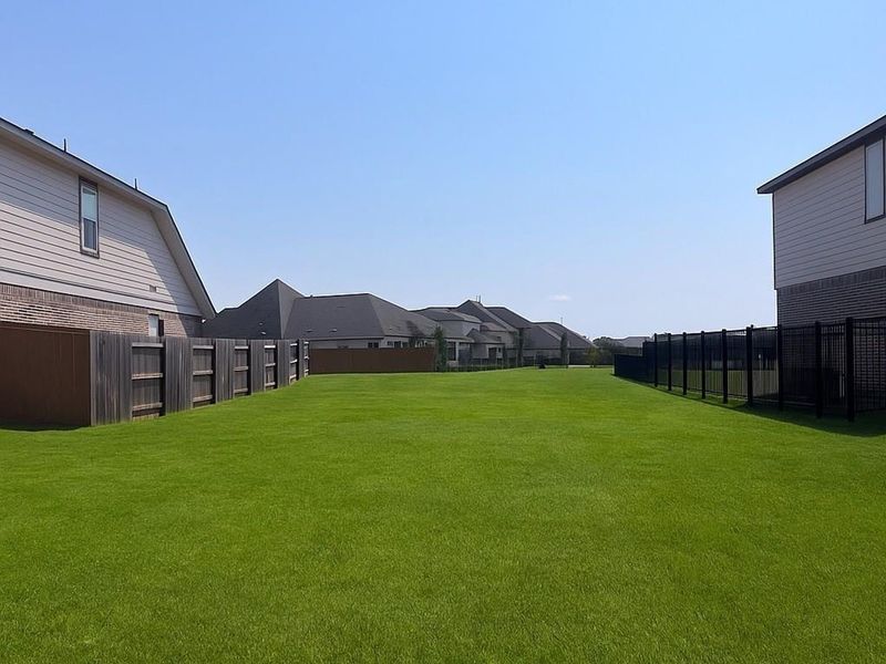 Exterior details and patio area of a home in Robins Landing, Houston (Image 3). Exterior details and patio area of a home in Robins Landing, Houston (Image 3).