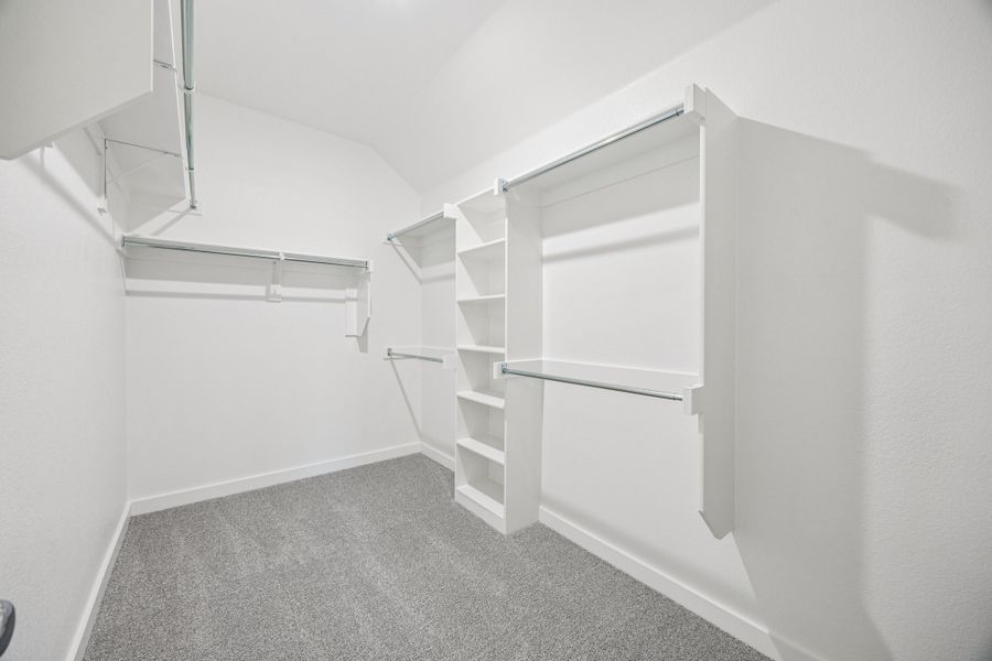 Primary Closet in the Oscar home plan by Trophy Signature Homes – REPRESENTATIVE PHOTO Primary Closet in the Oscar home plan by Trophy Signature Homes – REPRESENTATIVE PHOTO
