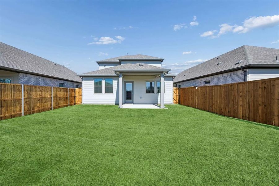 Covered Patio in the Mesquite home plan by Trophy Signature Homes – REPRESENTATIVE PHOTO Covered Patio in the Mesquite home plan by Trophy Signature Homes – REPRESENTATIVE PHOTO