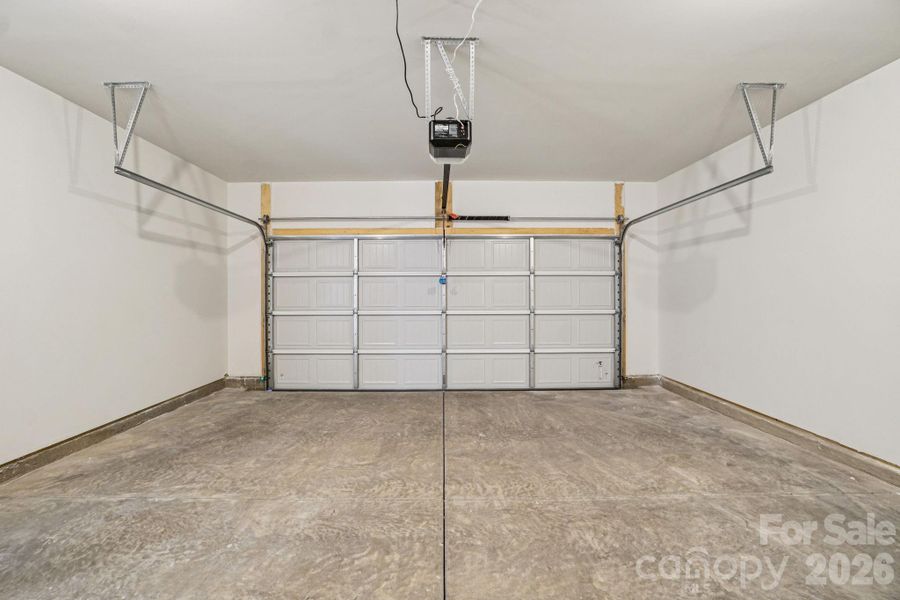 Spacious, unfurnished interior of a new home in Rydele Heights, Asheville (Image 23).