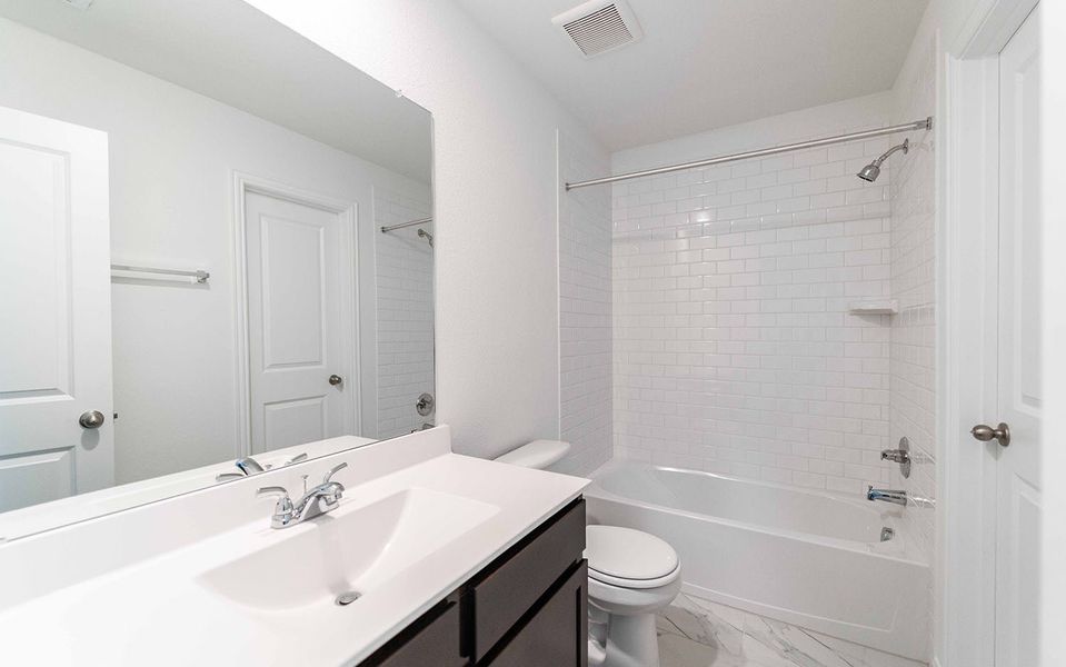 Furnished interior view inside a new home in Brooklands, Hutto (Image 7).