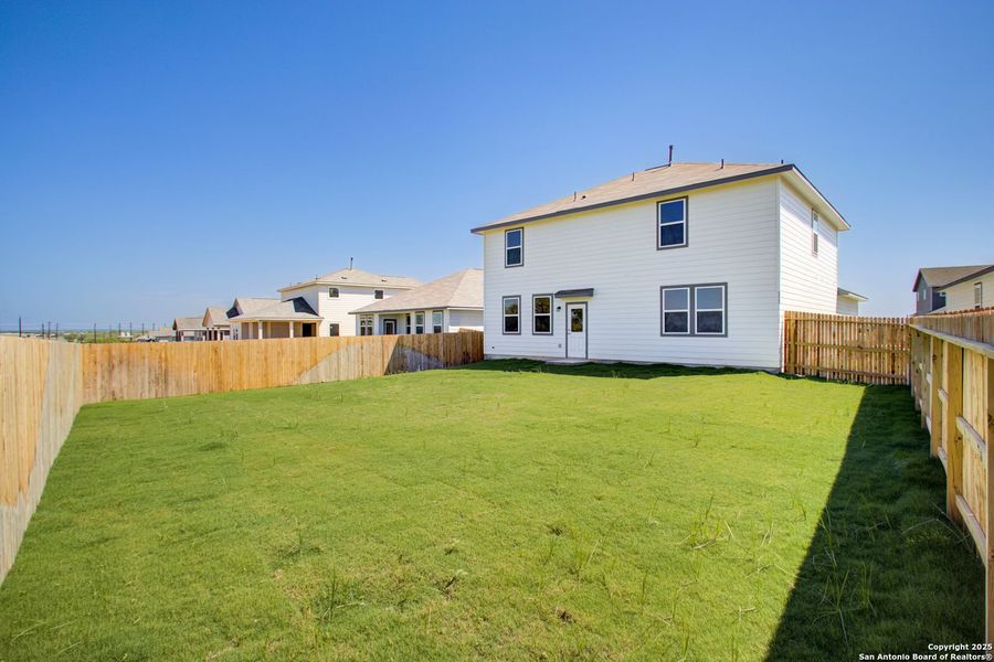 Front exterior of a new home in Hickory Ridge, San Antonio, TX, highlighting curb appeal (Image 72).