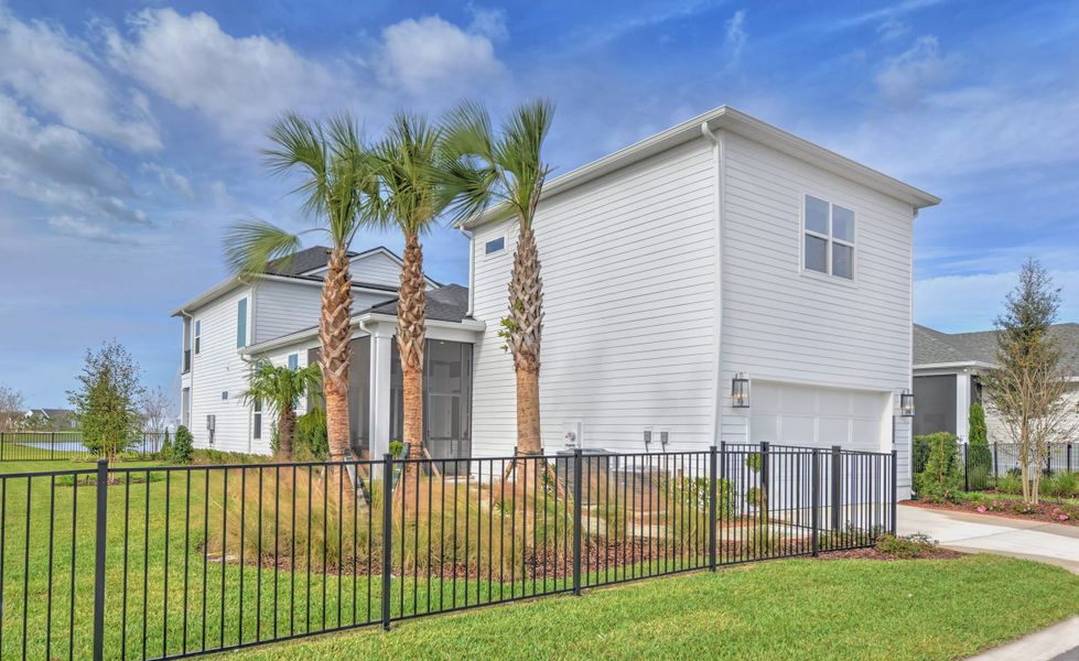 Front exterior of a new home in Seven Pines, Jacksonville, FL, highlighting curb appeal (Image 20). Front exterior of a new home in Seven Pines, Jacksonville, FL, highlighting curb appeal (Image 20).