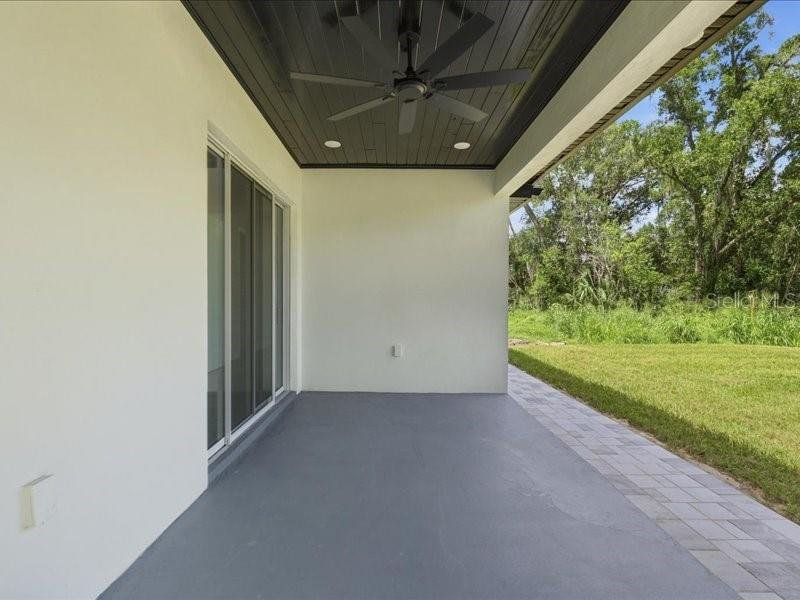Exterior details and patio area of a home in , Winter Haven (Image 30).