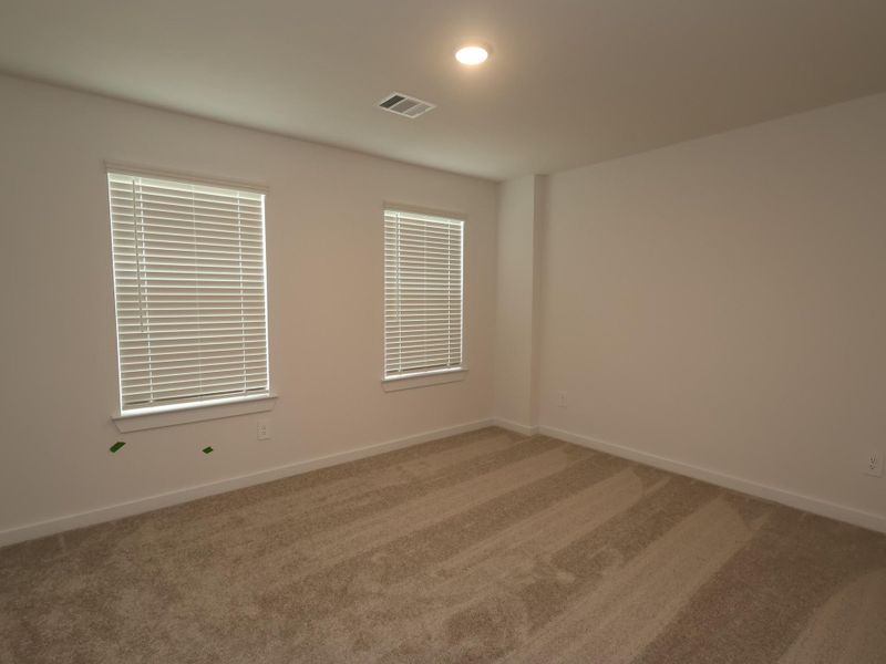Spacious, unfurnished interior of a new home in Lone Star Landing, Montgomery (Image 19).
