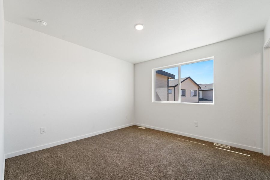 Spacious, unfurnished interior of a new home in Conestoga, Ault (Image 12).