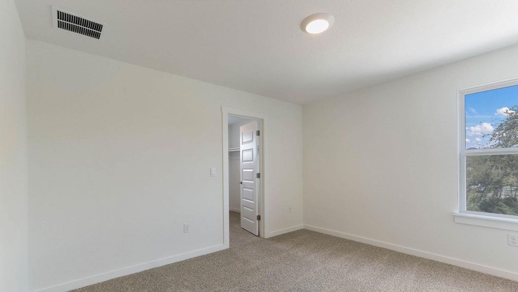 Spacious, unfurnished interior of a new home in Rosenbusch Ranch, Leander (Image 11).