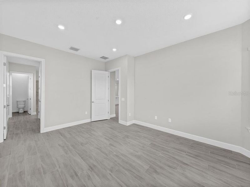 Spacious, unfurnished interior of a new home in Esplanade at Westview, Kissimmee (Image 19). Spacious, unfurnished interior of a new home in Esplanade at Westview, Kissimmee (Image 19).